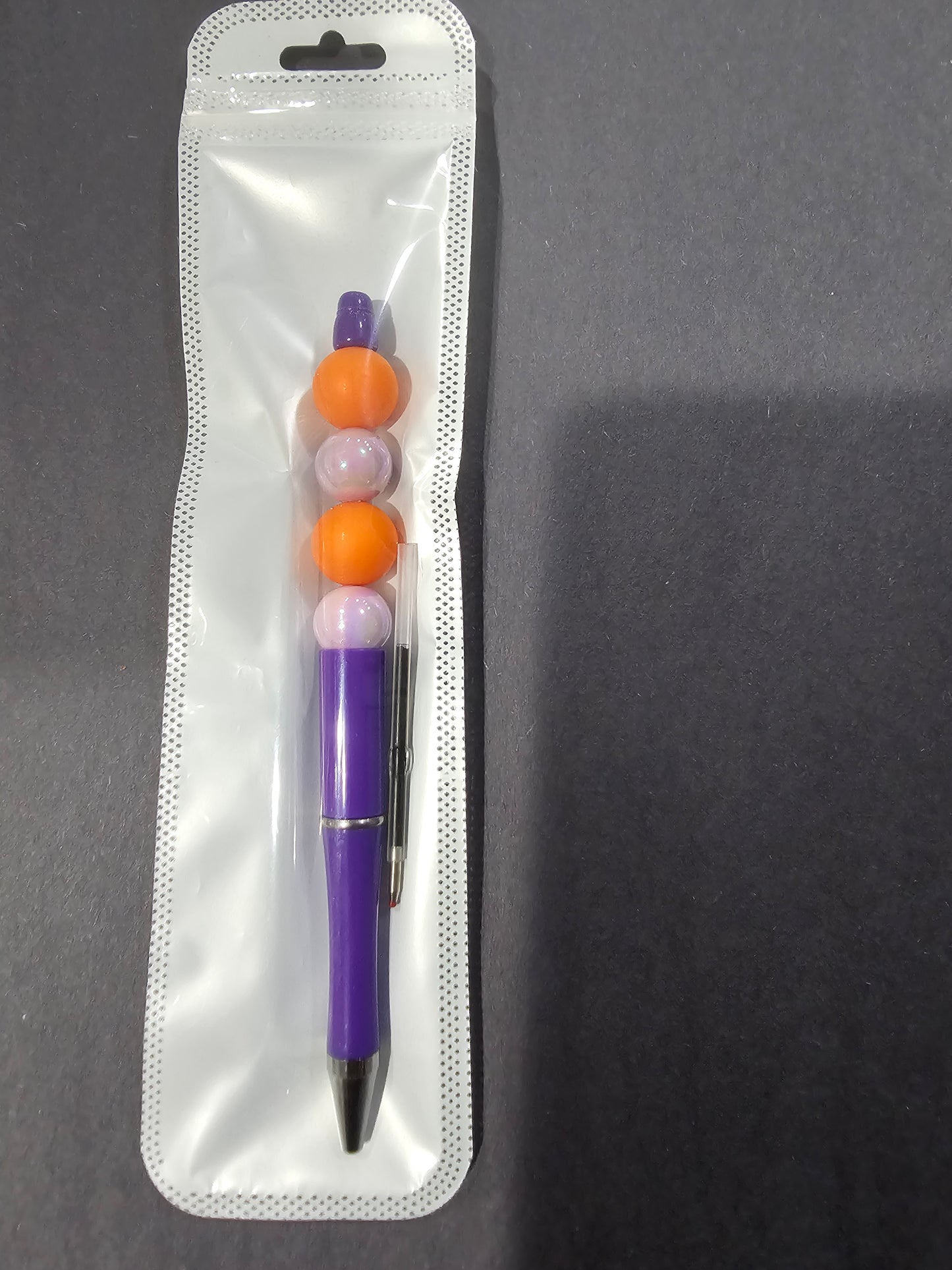 Purple and Orange Pen