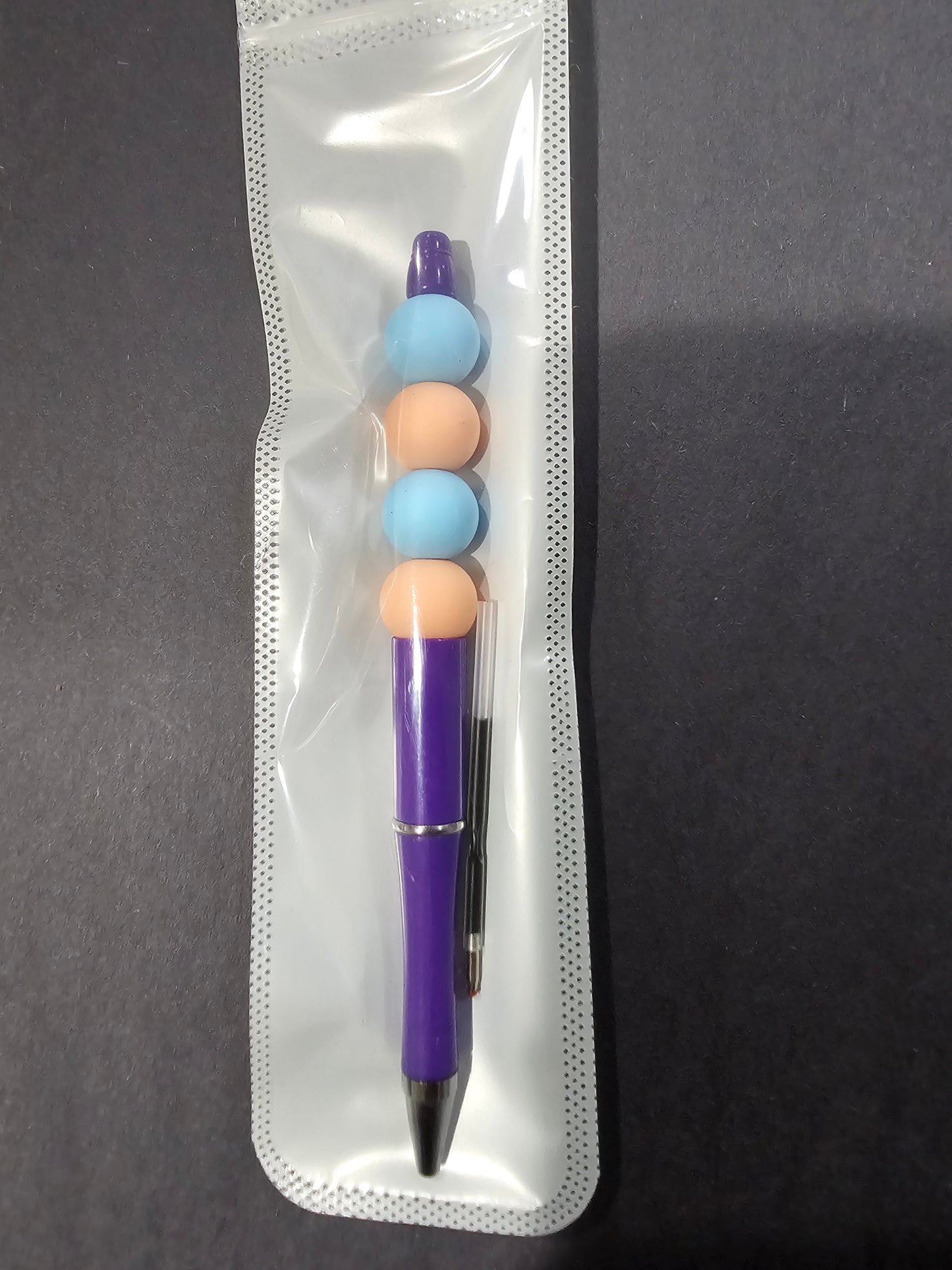 Peach, Blue, and Purple Pen