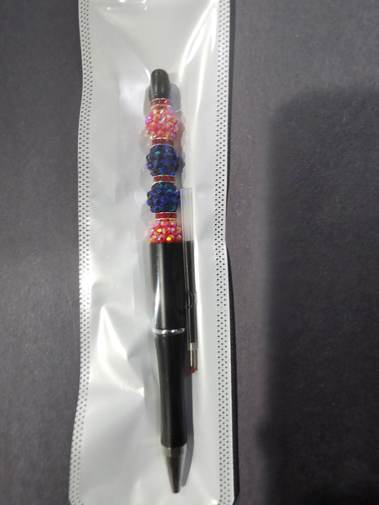 Red, Black, and Blue Pen