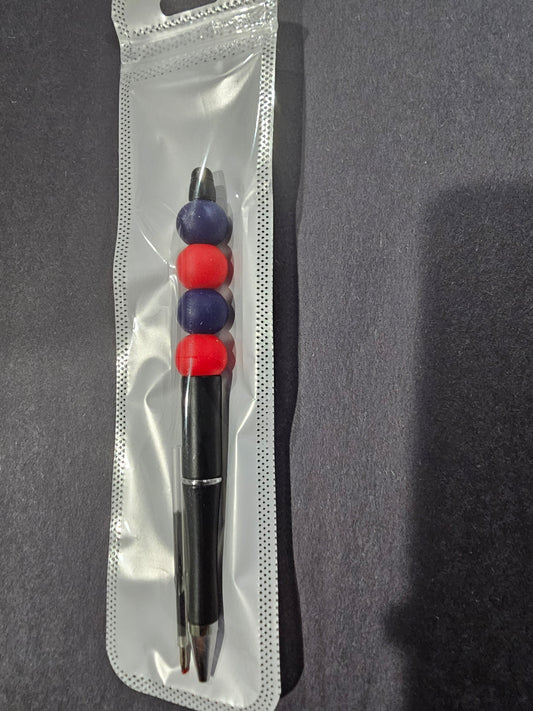 Black, Blue, and Red Pen